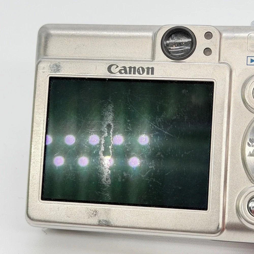 Canon PowerShot SD300 Digital ELPH 4.0MP Silver Camera Bundle SD Charger READ